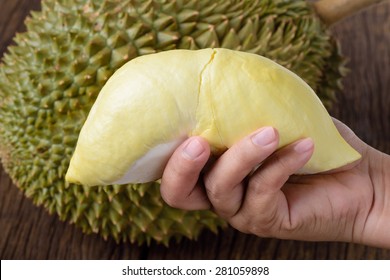 Closeup Yellow Durian Lobe In Hand