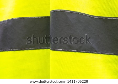 Closeup of Yellow High Visibility Neon Vest Stripe