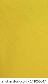 Closeup Of Yellow Plastic Fabric - Sport Shirt Material