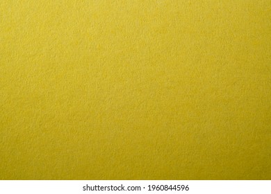 A Closeup Of Yellow Plastic Texture Background