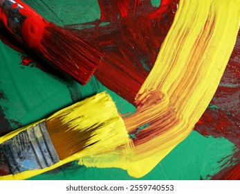 close-up yellow and red paintbrush and paint - Powered by Shutterstock