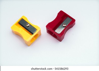closeup yellow and red of sharpner on white background