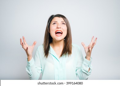 Closeup Of A Young Angry Woman Shouting 