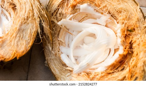 Closeup young coconut meat in coconut shell, healthy diet food 