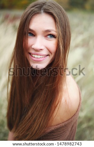 Similar – Outdoor portrait of beautiful happy teenager girl