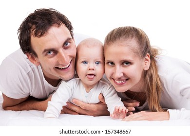 Closeup Of Young Family With Baby Boy Against White Background