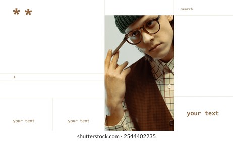 Close-up of young man in vintage-style glasses and green beanie, holding pen, dressed in brown vest and plaid shirt. Concept of modern fashion, youth culture. Banner template. Ads. - Powered by Shutterstock