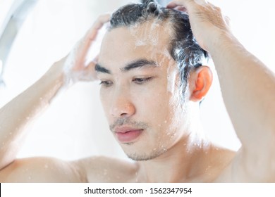 24,292 Man washing hair Images, Stock Photos & Vectors | Shutterstock