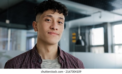 Close-up Young Motivated Confident Ambitious Guy Turns Head Looking At Camera Friendly And Welcoming Smiling Happy Successful Professional Leader Manager Student Posing Indoors Positive Male Portrait