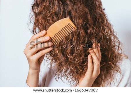 Similar – Image, Stock Photo Unrecognizable curly haired woman admiring mountains