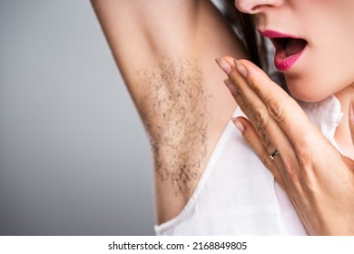 Close-up Of A Young Woman With Hairy Armpit