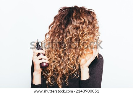 Image, Stock Photo Unrecognizable curly haired woman admiring mountains
