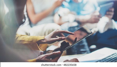 Closeup Young Woman Using Modern Tablet Hand.Hipster Making Great Business Idea.Coworker People Professional Gathered Together Decision Corporate Work.Startup Creative Presentation Concept Blurred. - Powered by Shutterstock