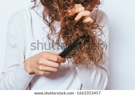 Similar – Image, Stock Photo Unrecognizable curly haired woman admiring mountains