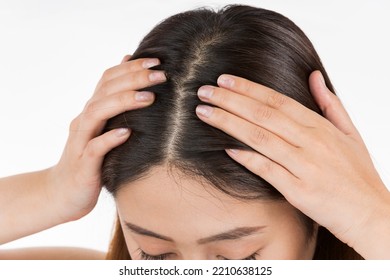Close-up of a young woman's scalp . - Shutterstock ID 2210638125