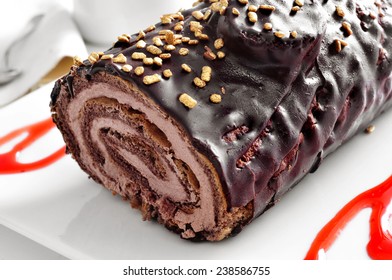 closeup of a yule log cake, traditional of christmas time, on a set table