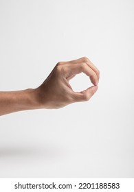 Closeup Of Zero Hand Gesture Isolated On White Background