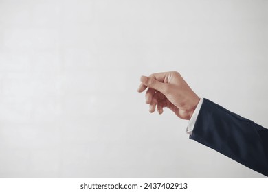 Close-upFemale hands wearing a business suit, white background - Powered by Shutterstock