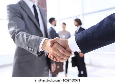 Closeup.reliable Handshake Of Business Partners