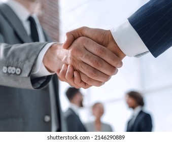 Closeup.reliable Handshake Of Business Partners