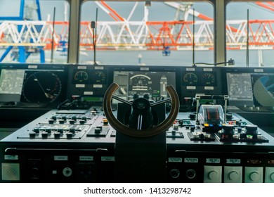 Closuep Shot Of 
Ship's Rudder Located In The Cockpit Of A Container Ship From Which The Captain Controls The Ship And All Operations Carried Out On The Ship. Gdańsk, Pomerania / Poland - May 15 2019