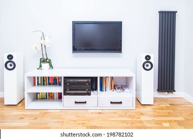 A Closup Of Modern Living Room Equipment With TV And Stereo