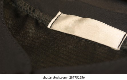 Cloth Label Tags On The Inside Of The Shirt