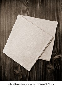 Cloth Napkin On Wooden Background