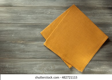 Cloth Napkin On Wooden Table Background