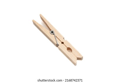 Cloth pin for laundry isolated on white background. Natural color wood clothespin, laundry dry peg closeup view.