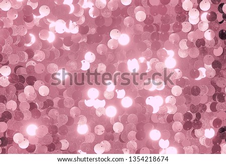 cloth richly decorated with pink, rose, shiny sequins