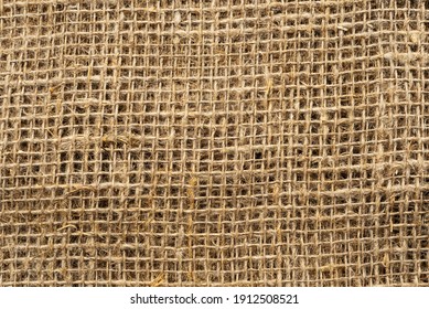 Cloth. The Texture Of The Burlap Fabric Is Close-up. Packaging Material. Background Of Burlap Hessian Sacking