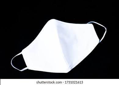 Cloth White Mask Isolated On Black Background - For Prevent Dust (PM 2.5), 
Disease (Coronavirus Or COVID-19).