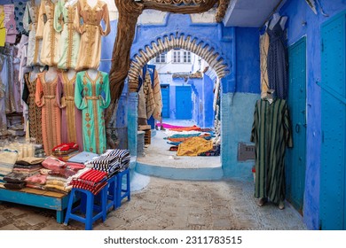 Clothe shop in Chefchaouen streets - Shutterstock ID 2311783515