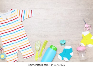 Clothes With Baby Supplies On The Floor