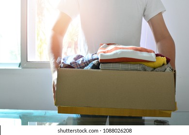 clothes in box for concept donation and reuse recycle  - Shutterstock ID 1088026208