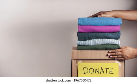 Clothes Donation, Renewable Concept.Box Of Use Old Cloth. Preparing Garment At Home Before Donate