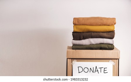 Clothes Donation, Renewable Concept.Box Of Use Old Cloth. Preparing Garment At Home Before Donate