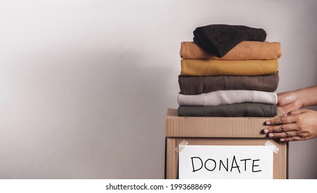 Clothes Donation, Renewable Concept.Box Of Use Old Cloth. Preparing Garment At Home Before Donate