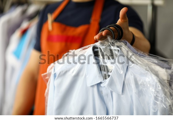 Clothes Dry Cleaning Service Worker Returning Stock Photo (Edit Now ...