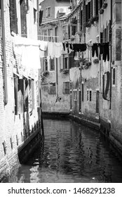 Clothes Drying On A Line Between Two Buildings