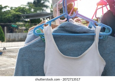 Clothes Hanging With Hangers On Outdoor Clothesline.