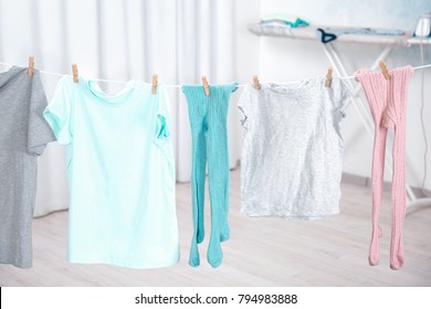 Clothes Hanging On Laundry Line Indoors