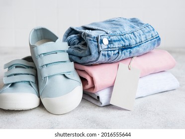 Clothes For Kids. Online Shopping Concept. Delivery Of Clothes.