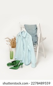 Clothes on a chair. Product photography, fashion still life. Spring summer outfits. - Shutterstock ID 2278489559