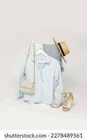 Clothes on a chair. Product photography, fashion still life. Spring summer outfits. - Shutterstock ID 2278489561