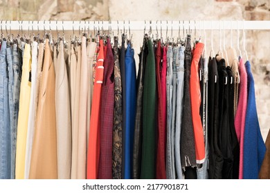 Clothes On Hangers - Second Hand Clothes Store Or Thrift Shop. Clothing Rental Service. Clothes Rail With Copy Space For Text. Selective Focus