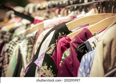 Clothes On A Rack On A Flea Market.