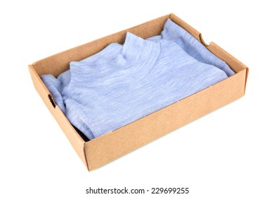 Clothes in open container isolated on white background