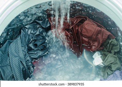 Clothes In Washing Machine. Laundry Concept.